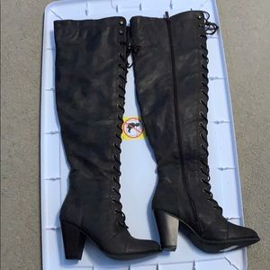 Thigh high brown combat boots